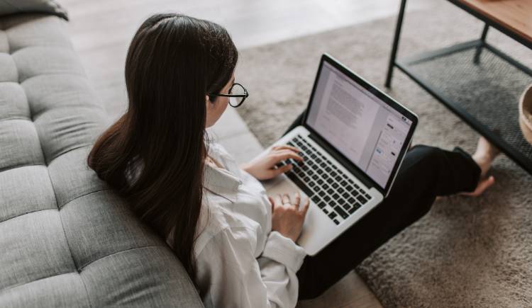 Woman working on Word on Laptop