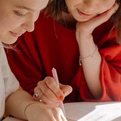 Teacher and student working on basic skills