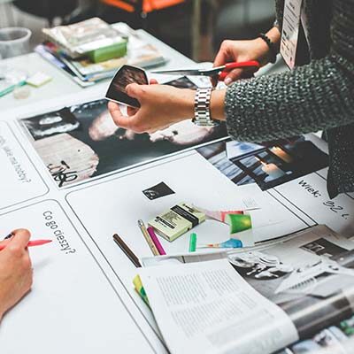Designers reviewing color palettes and fabric samples