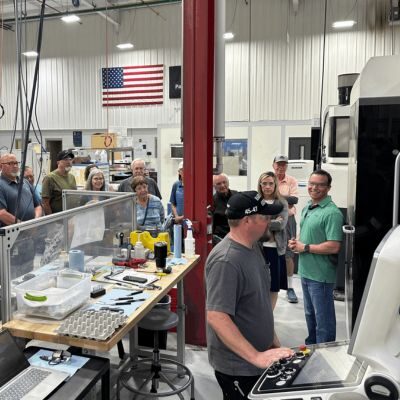 Group taking a tour of the Spartronics business