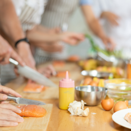 Group of friends gathering to cook a meal.