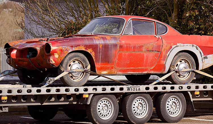 red-coupe-on-flatbed-trailer-943930